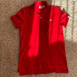 A Lacoste red formal shirt.